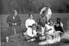 Blue binder photos 015  Back Charolette Lindgren Emma Hilma Selma Edith Front Carl and Hilma reclining middle two unknown