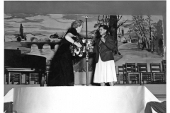 Blue binder photos 008 Hilma Walker presenting Gracie Fields a bouquet form the ladies of the Order of the Royal Purple 1949