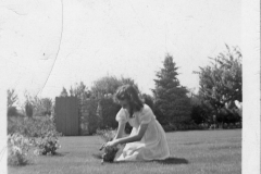 Gray Binder Photos 327 Eileen at the grave of Billie Doran (her brother larrys son) at Forest Lawn Cemetary