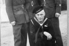 Gray Binder Photos 384 war back L to R Wally Doran Les  Smith and Doug Brown and sailor who