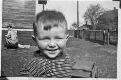 Gray Binder Photos 390 possibly Larry Vanstone, Wally Doran in background