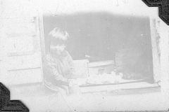 Gray Binder Photos 476 possibly Billy Doran in Bralorne feeding chicks