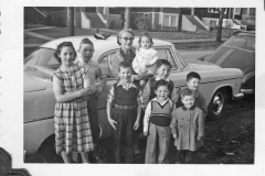 Gray Binder Photos 481 L to R Arlene Bob & Ted Olsen Jessie holding Maureen Bill & Jim Doran Paddy & Mick Apr 1956