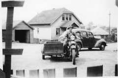 Gray Binder Photos 242 Carl and his Motorcycle coner of 2nd ave