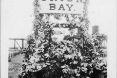 Gray Binder Photos 497 May Queen float leaving Union Bay Dave driving and Carl beside him