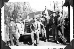 Hilma & Daves album 077 crew moving the boat to Sproat Lake Carl on right