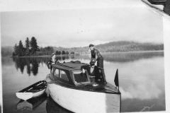 Eileens-photo-album-165-Jack-in-boat-and-who-at-Sproat-lake