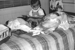 Photo booklets 077 Paddy Reading to Kel Christmas 1954